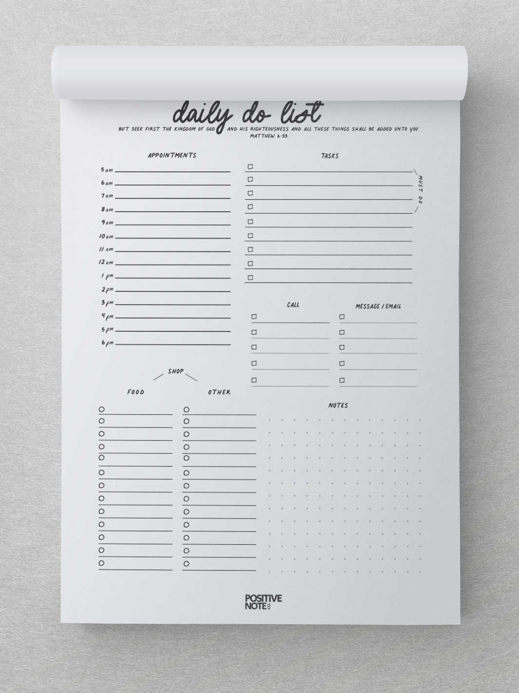 A notepad reads Daily Do List in cursive font at the top. A bible verse is under the title.  The christian daily planner notepad has a place for appointments, tasks, notes, calls, messages and emails and shopping lists.